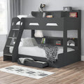 Black bunk bed with desk in a room setting